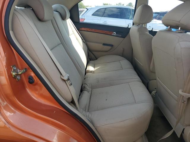 KL1TD56637B126983 - 2007 CHEVROLET AVEO BASE Նարնջագույն լուսանկար 10