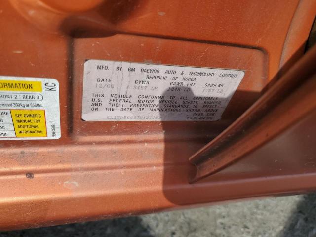 KL1TD56637B126983 - 2007 CHEVROLET AVEO BASE Նարնջագույն լուսանկար 12