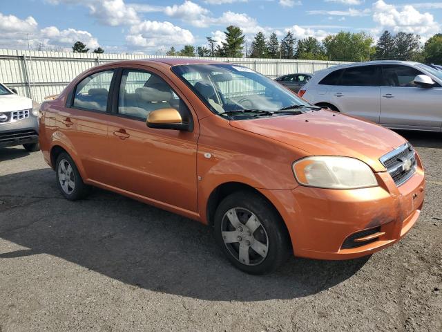 KL1TD56637B126983 - 2007 CHEVROLET AVEO BASE Նարնջագույն լուսանկար 4