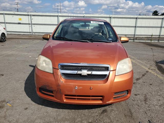 KL1TD56637B126983 - 2007 CHEVROLET AVEO BASE Նարնջագույն լուսանկար 5
