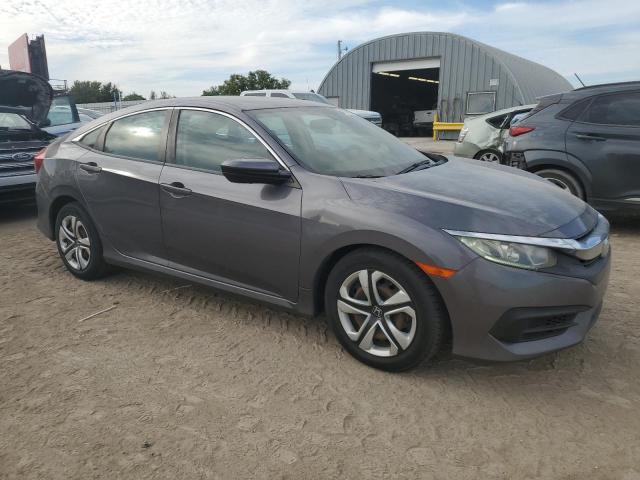 19XFC2F5XJE038408 - 2018 HONDA CIVIC LX GRAY photo 4
