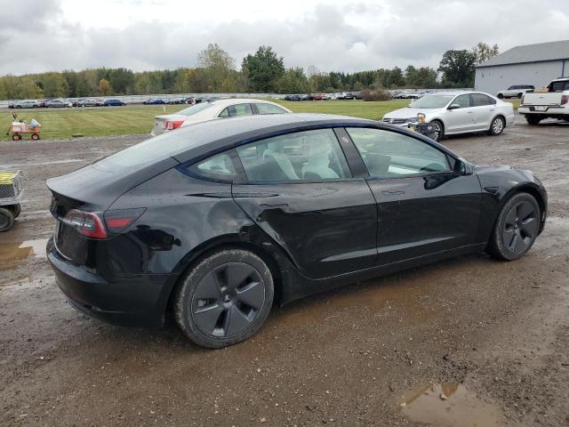 5YJ3E1EA4PF394250 - 2023 TESLA MODEL 3 Schwarz Foto 3