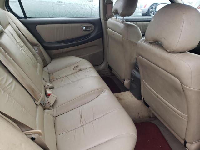 JN1CA31D6YT703371 - 2000 NISSAN MAXIMA GLE BEIGE photo 10