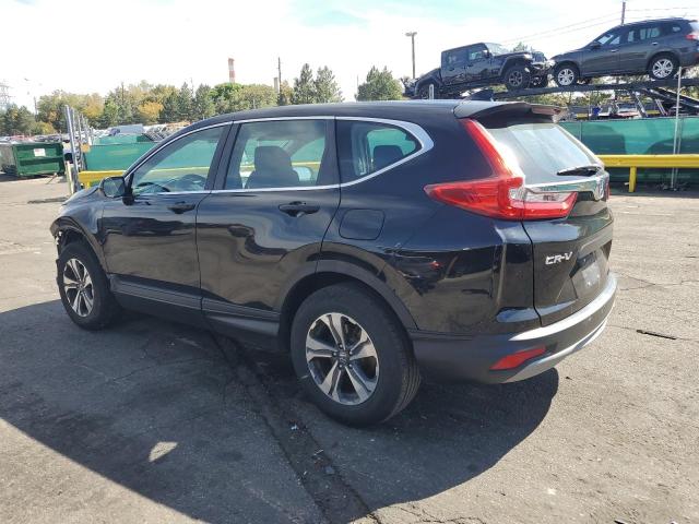 2HKRW6H35KH227021 - 2019 HONDA CR-V LX Schwarz Foto 2