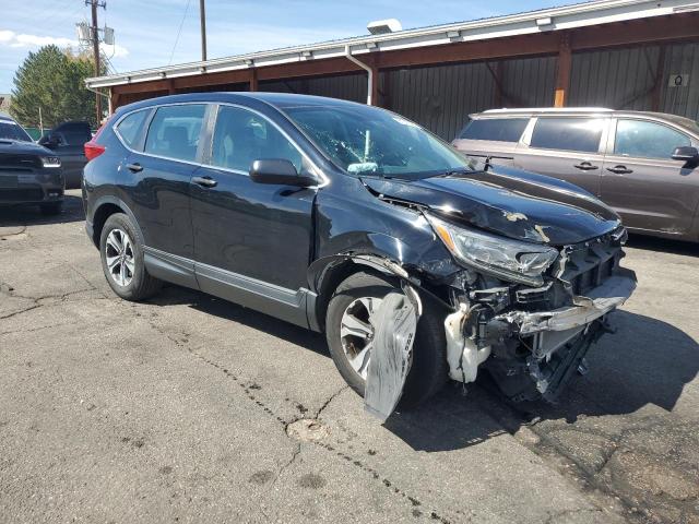 2HKRW6H35KH227021 - 2019 HONDA CR-V LX Schwarz Foto 4