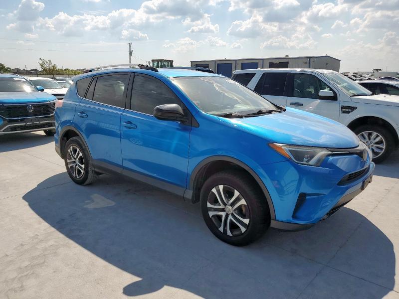 JTMZFREV8JJ158094 - 2018 TOYOTA RAV4 LE BLUE photo 4