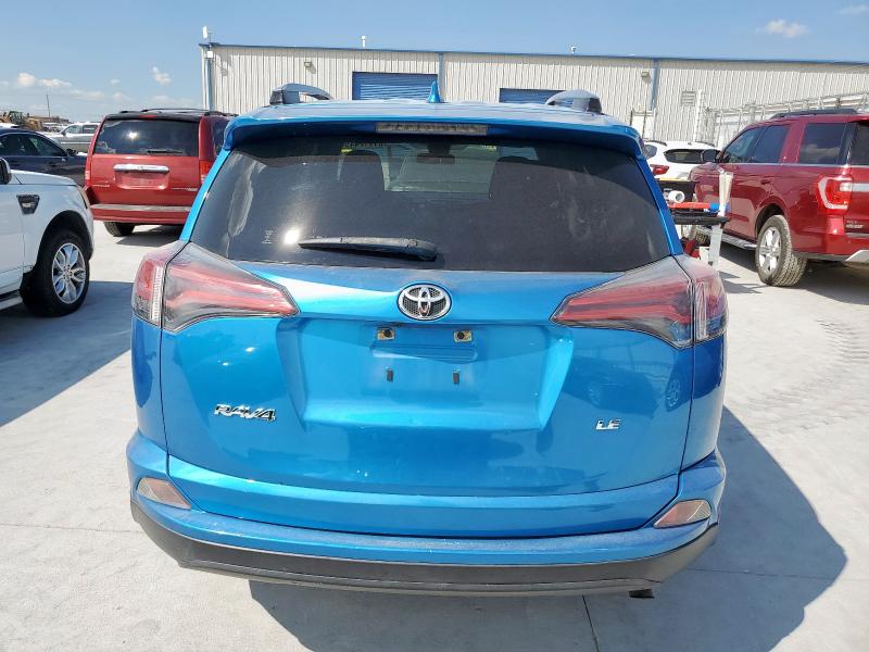 JTMZFREV8JJ158094 - 2018 TOYOTA RAV4 LE BLUE photo 6