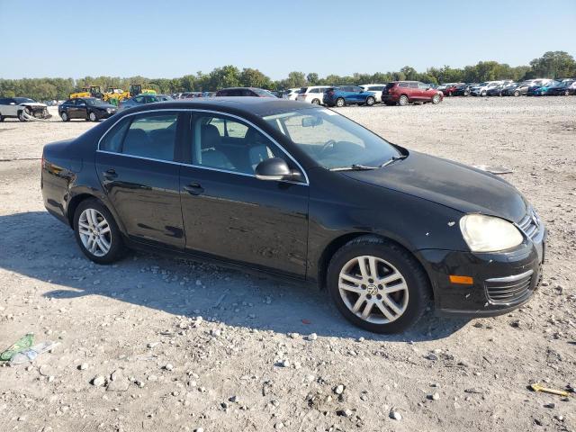 3VWRM71K19M127853 - 2009 VOLKSWAGEN JETTA SE BLACK photo 4