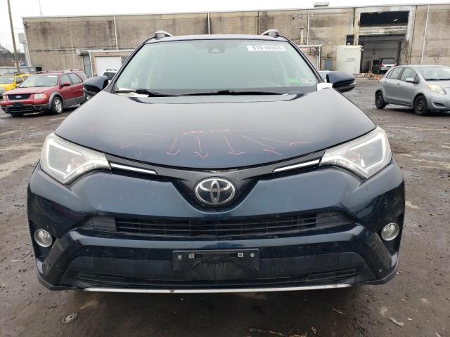 JTMRFREVXHJ170029 - 2017 TOYOTA RAV4 XLE BLUE photo 5