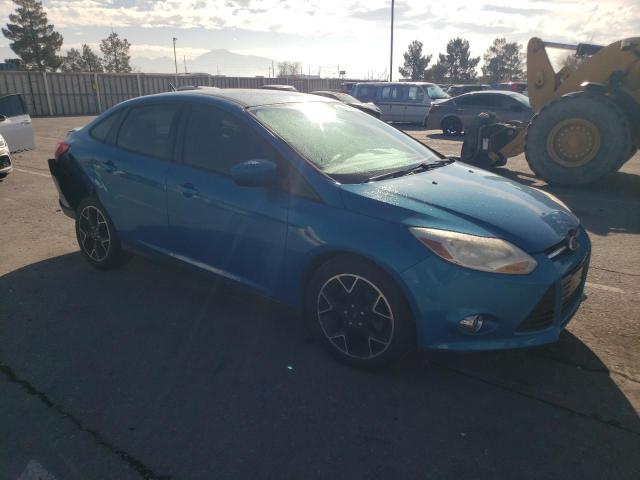 1FAHP3F27CL381153 - 2012 FORD FOCUS SE BLUE photo 4