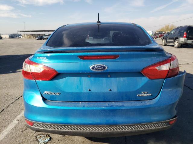 1FAHP3F27CL381153 - 2012 FORD FOCUS SE BLUE photo 6