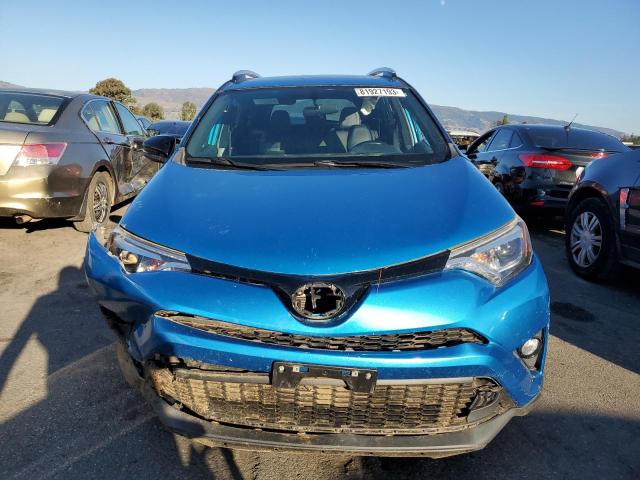 JTMJFREV7GD184786 - 2016 TOYOTA RAV4 SE BLUE photo 5