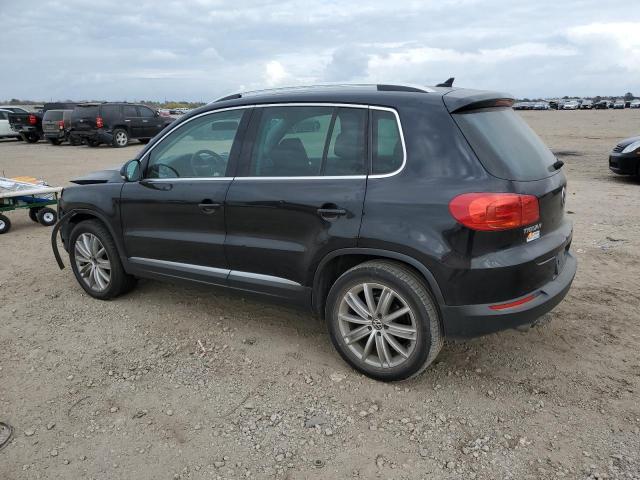 WVGAV7AX0CW556008 - 2012 VOLKSWAGEN TIGUAN S BLACK photo 2