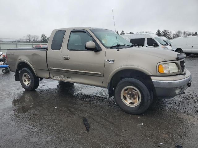 1FTRX18WX2NA50296 - 2002 FORD F150 TAN photo 4