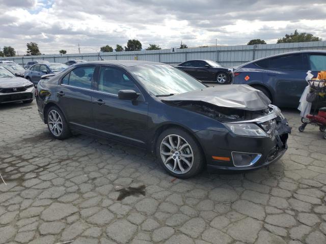 3FAHP0HA9BR155800 - 2011 FORD FUSION SE BLACK photo 4