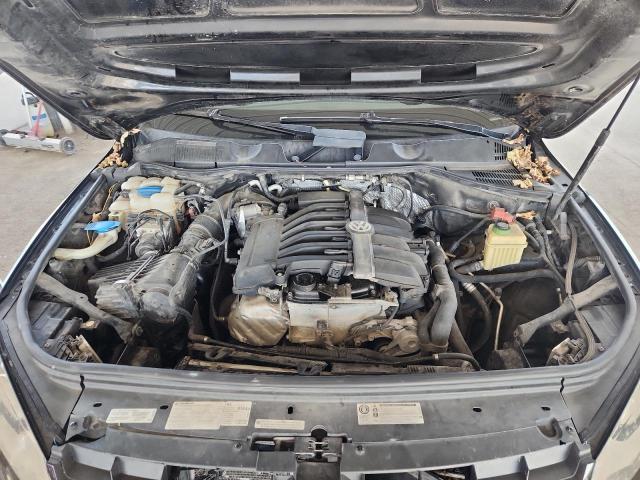WVGEF9BP2CD007172 - 2012 VOLKSWAGEN TOUAREG V6 Schwarz Foto 12