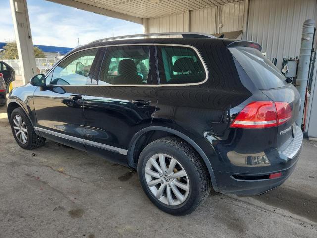 WVGEF9BP2CD007172 - 2012 VOLKSWAGEN TOUAREG V6 Schwarz Foto 2