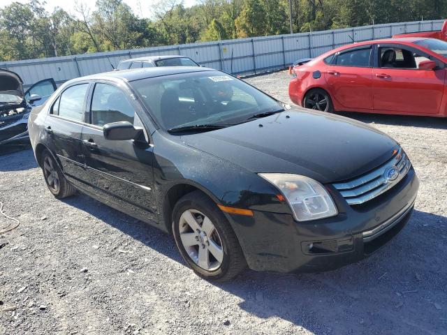 3FAHP07Z99R135032 - 2009 FORD FUSION SE BLACK photo 4