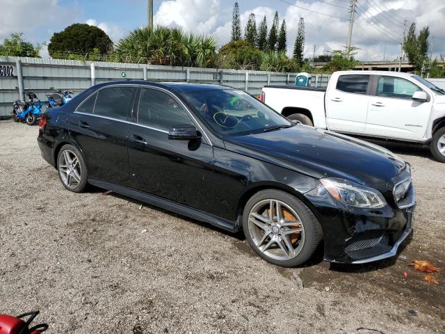 WDDHF8JB2EA973212 - 2014 MERCEDES-BENZ E 350 4MATIC BLACK photo 4