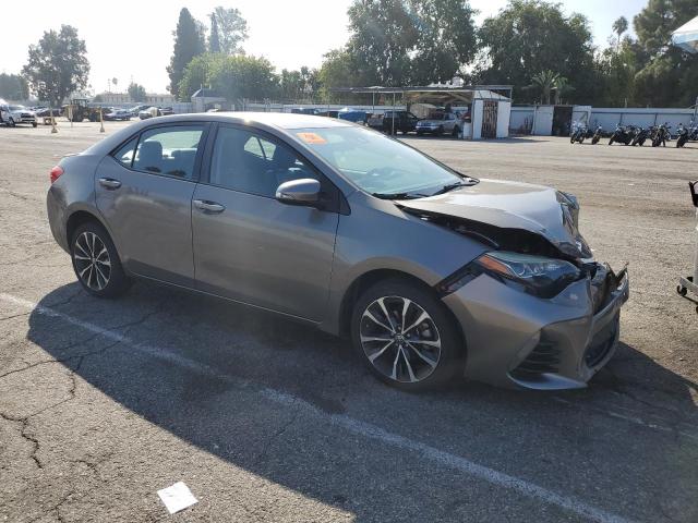 5YFBURHEXHP630613 - 2017 TOYOTA COROLLA L Grau Foto 4