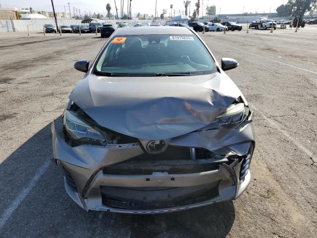 5YFBURHEXHP630613 - 2017 TOYOTA COROLLA L Grau Foto 5