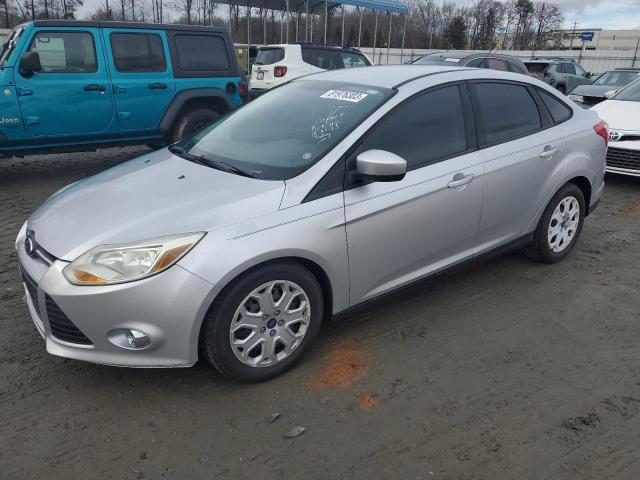 1FAHP3F2XCL352861 - 2012 FORD FOCUS SE SILVER photo 1