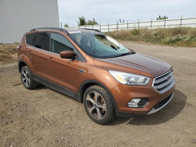 1FMCU9G92HUB83475 - 2017 FORD ESCAPE SE BROWN photo 4