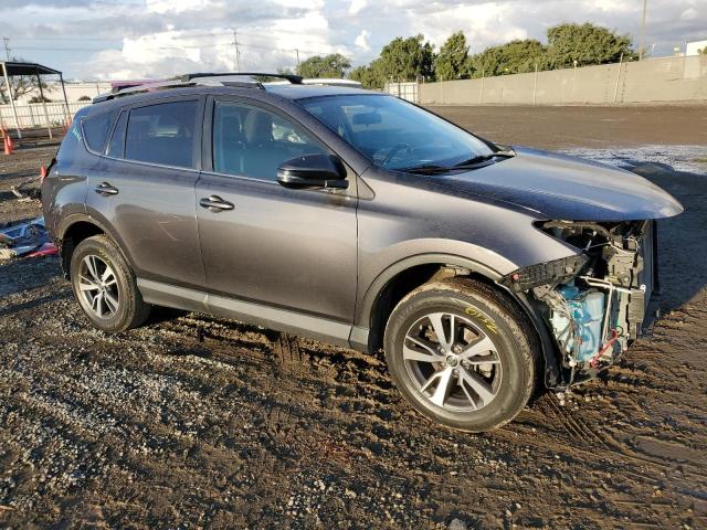 JTMWFREV6GJ094777 - 2016 TOYOTA RAV4 XLE GRAY photo 4