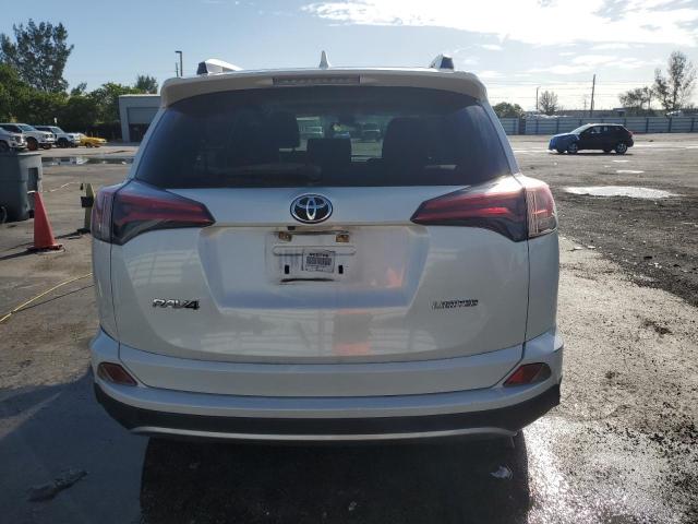 JTMYFREV0JJ157629 - 2018 TOYOTA RAV4 LIMITED WHITE photo 6