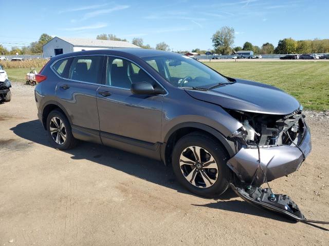 2HKRW6H36JH231111 - 2018 HONDA CR-V LX GRAY photo 4