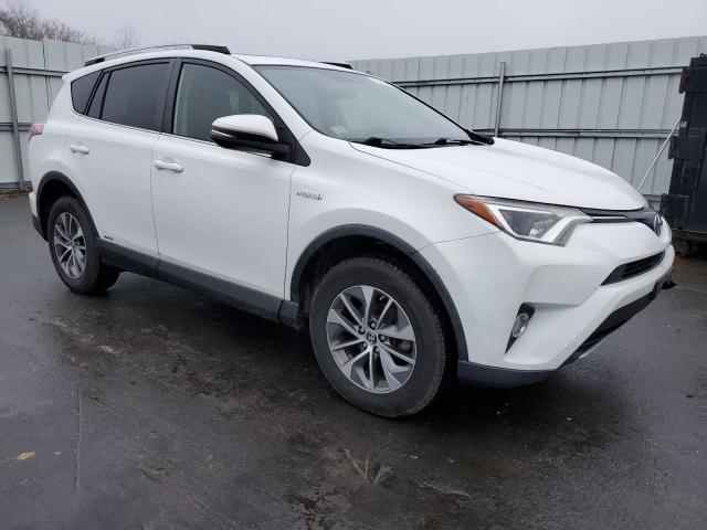 JTMRJREV2GD024817 - 2016 TOYOTA RAV4 HV XLE WHITE photo 4