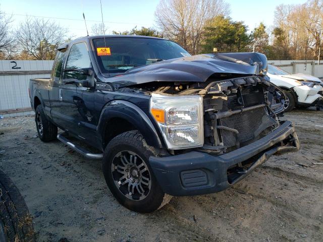 1FT7X2AT4BEC44819 - 2011 FORD F250 SUPER DUTY BLACK photo 4