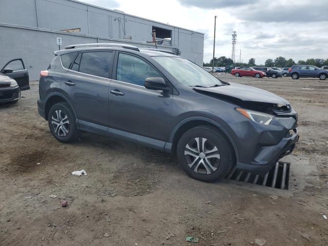 2T3ZFREV7HW350361 - 2017 TOYOTA RAV4 LE GRAY photo 4