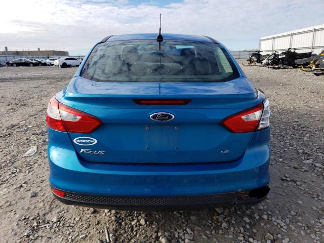 1FAHP3F26CL353523 - 2012 FORD FOCUS SE BLUE photo 6