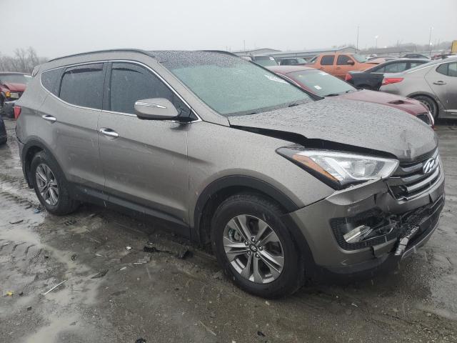 5XYZU3LB0GG310325 - 2016 HYUNDAI SANTA FE S TAN photo 4