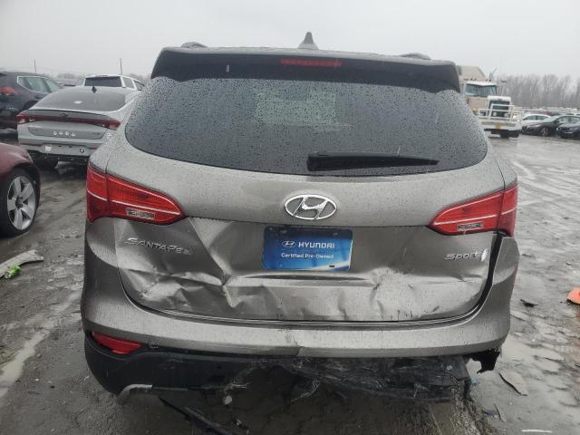 5XYZU3LB0GG310325 - 2016 HYUNDAI SANTA FE S TAN photo 6