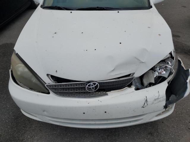 4T1BF30K72U020554 - 2002 TOYOTA CAMRY LE WHITE photo 11