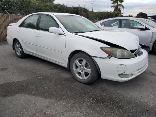 4T1BF30K72U020554 - 2002 TOYOTA CAMRY LE WHITE photo 4