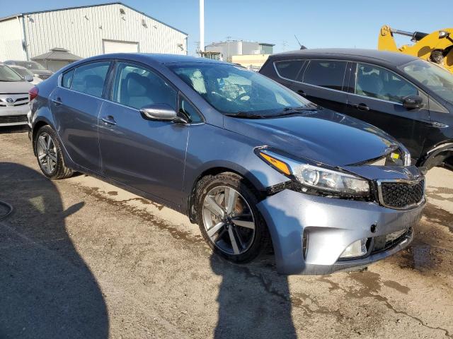 3KPFN4A81HE068852 - 2017 KIA FORTE EX GRAY photo 4