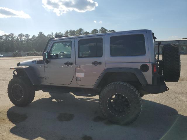 1C4BJWEG9EL198579 - 2014 JEEP WRANGLER U SAHARA GRAY photo 2