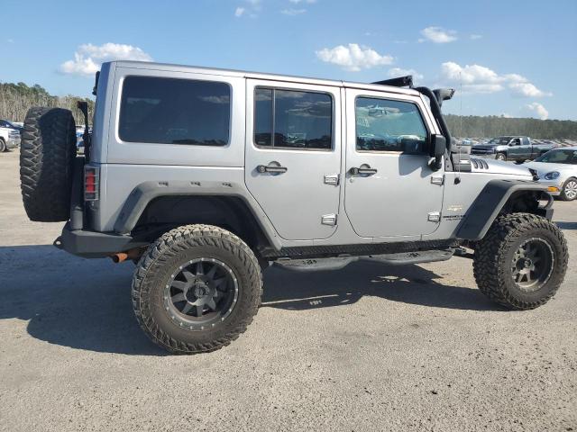 1C4BJWEG9EL198579 - 2014 JEEP WRANGLER U SAHARA GRAY photo 3