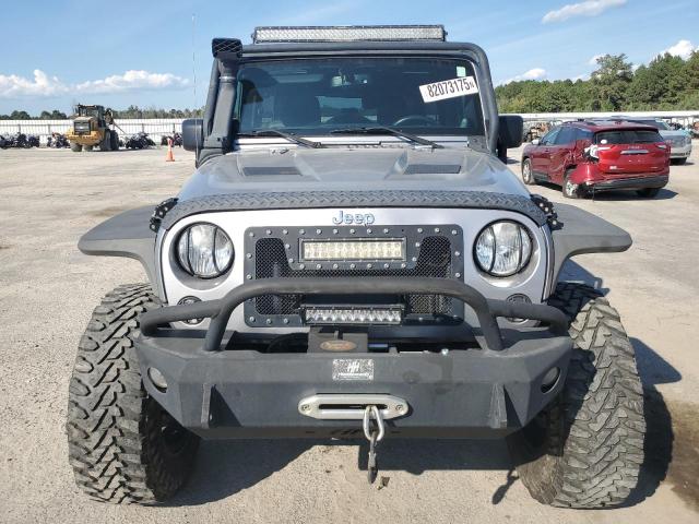 1C4BJWEG9EL198579 - 2014 JEEP WRANGLER U SAHARA GRAY photo 5