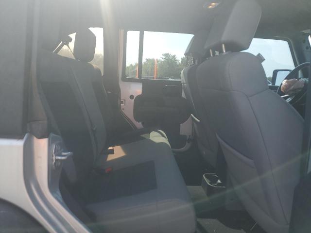 1J4HA3H11AL124965 - 2010 JEEP WRANGLER U SPORT SILVER photo 10
