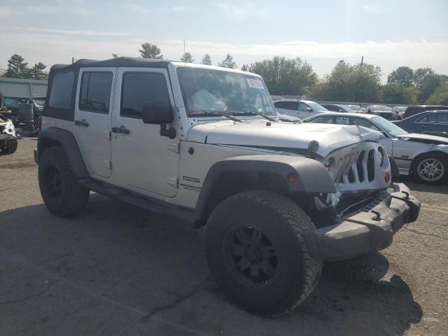 1J4HA3H11AL124965 - 2010 JEEP WRANGLER U SPORT SILVER photo 4