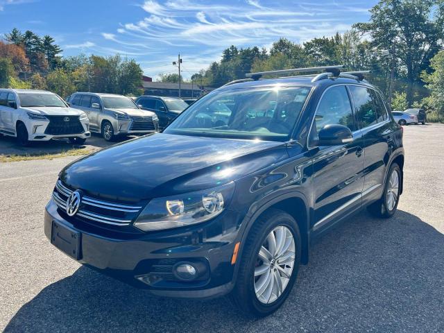 WVGBV7AX5CW608902 - 2012 VOLKSWAGEN TIGUAN S BLACK photo 2