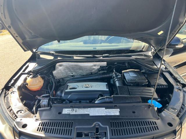 WVGBV7AX5CW608902 - 2012 VOLKSWAGEN TIGUAN S BLACK photo 7