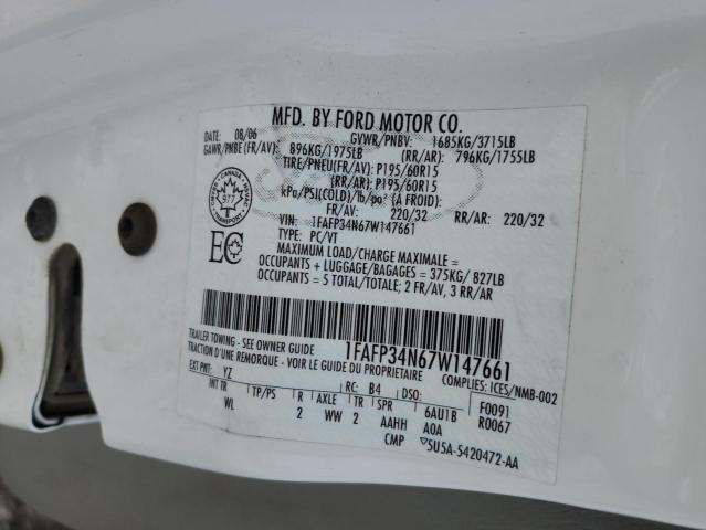 1FAFP34N67W147661 - 2007 FORD FOCUS ZX4 WHITE photo 12