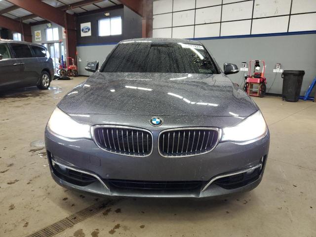 WBA3X9C59GD869216 - 2016 BMW 335 XIGT GRAY photo 5