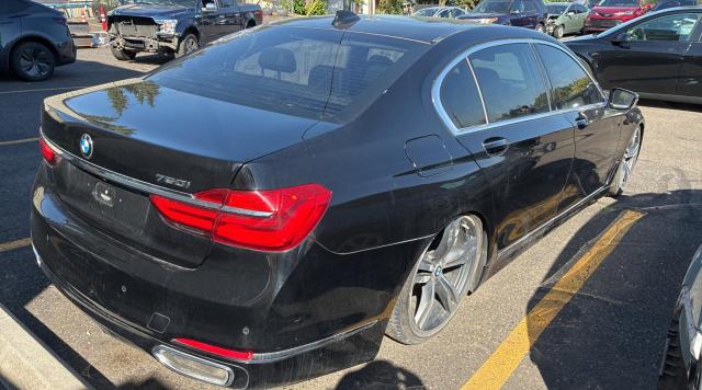 WBA7F0C35HGM21697 - 2017 BMW 750 I BLACK photo 4