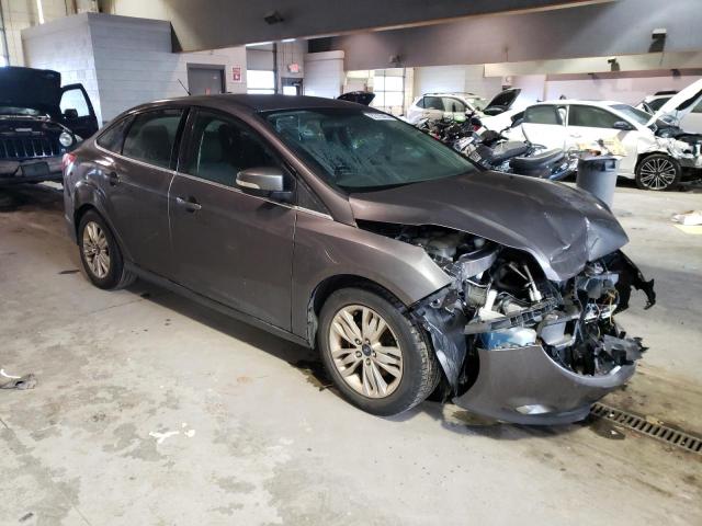 1FAHP3H21CL462727 - 2012 FORD FOCUS SEL GRAY photo 4